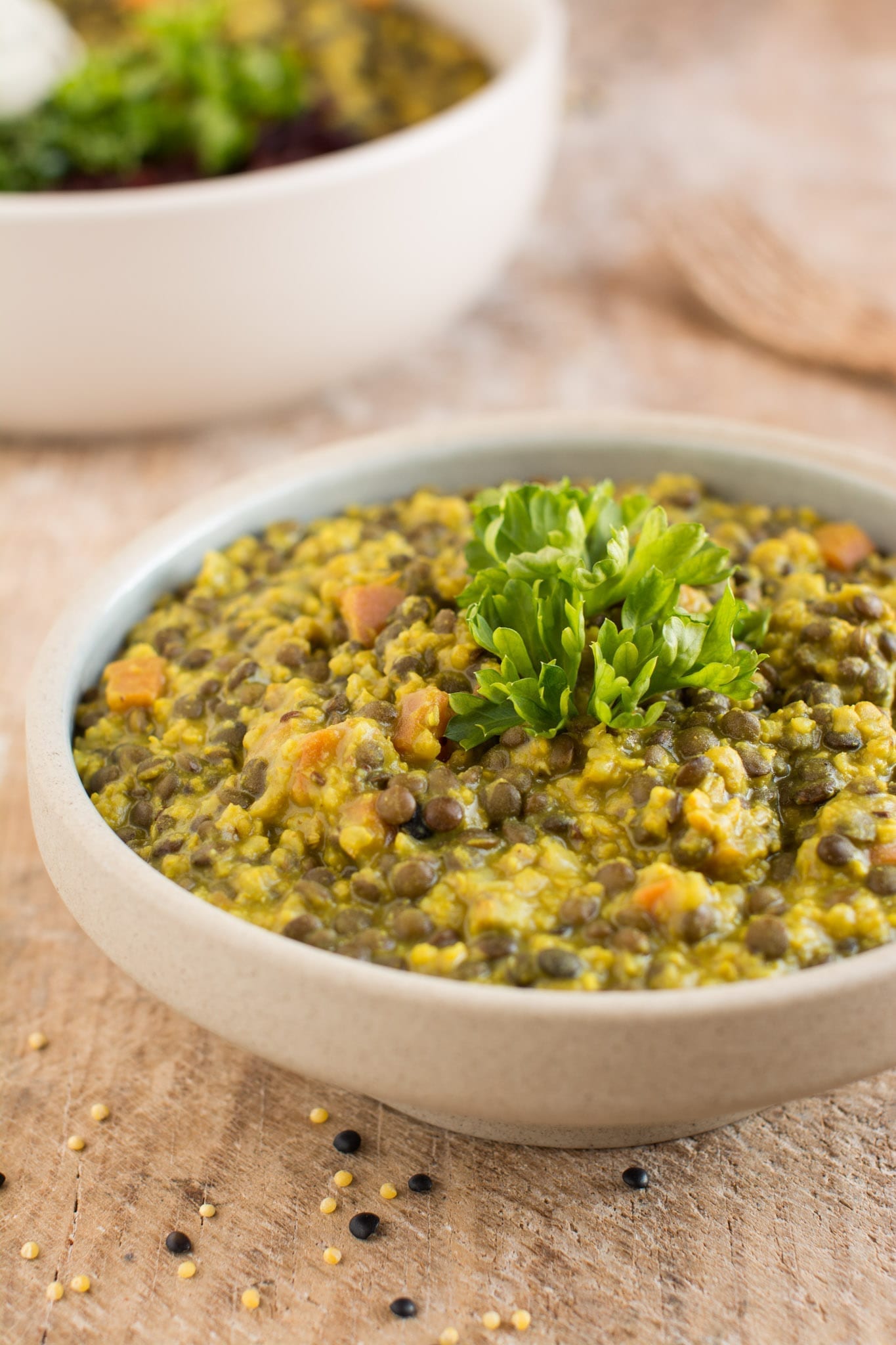 Easy and delicious oil-free vegan dal recipe with millet and black lentils.