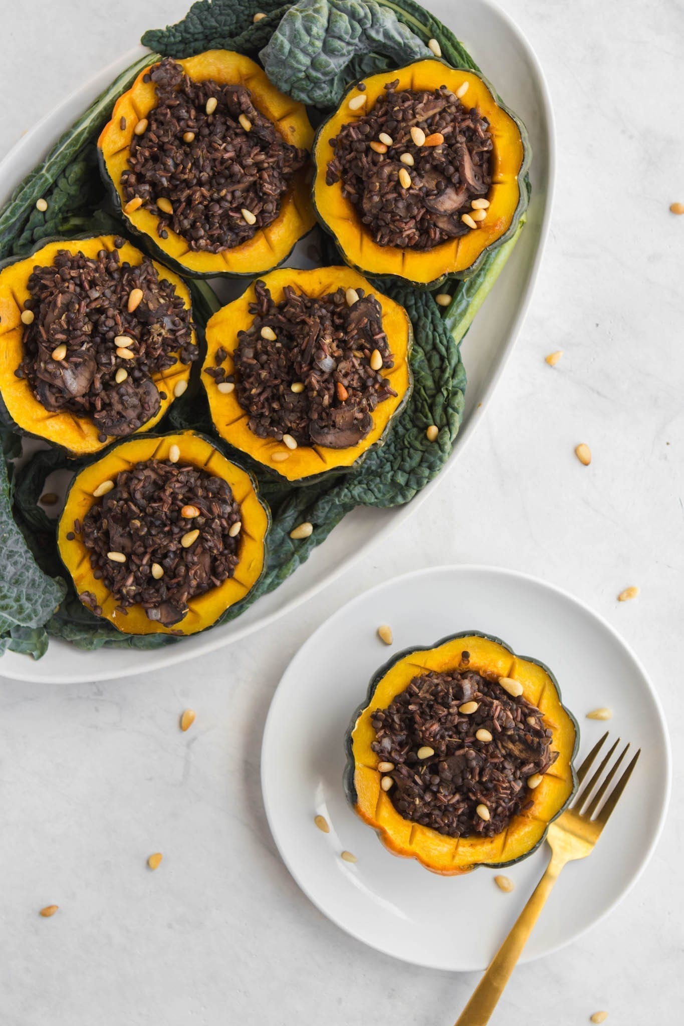 Vegan Christmas Dinner Maple Roasted Acorn Squash with Rice Lentil Stuffing