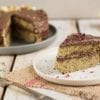 Easy gluten-free and oil-free vegan lemon cake with poppy seeds. It comes with chocolate frosting and tons of healthy legumes and veggies hidden inside.