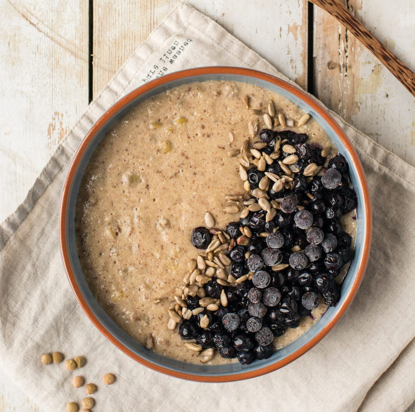 This vegan lentil oatmeal is a perfect low glycemic breakfast porridge recipe that will keep your blood sugar stable.