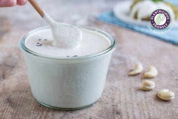 Vegan oil-free and gluten-free cashew sour cream that is quick to make and serves perfectly as dairy-free salad dressing or vegan mayonnaise in Russian potato salad.