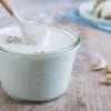 Vegan oil-free cashew sour cream that is quick to make and serves perfectly as dairy-free salad dressing or vegan mayonnaise in Russian potato salad.