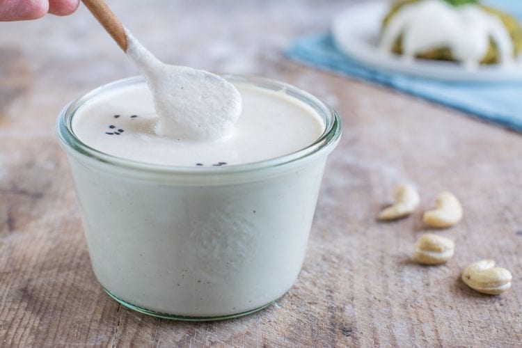 Vegan oil-free cashew sour cream that is quick to make and serves perfectly as dairy-free salad dressing or vegan mayonnaise in Russian potato salad.