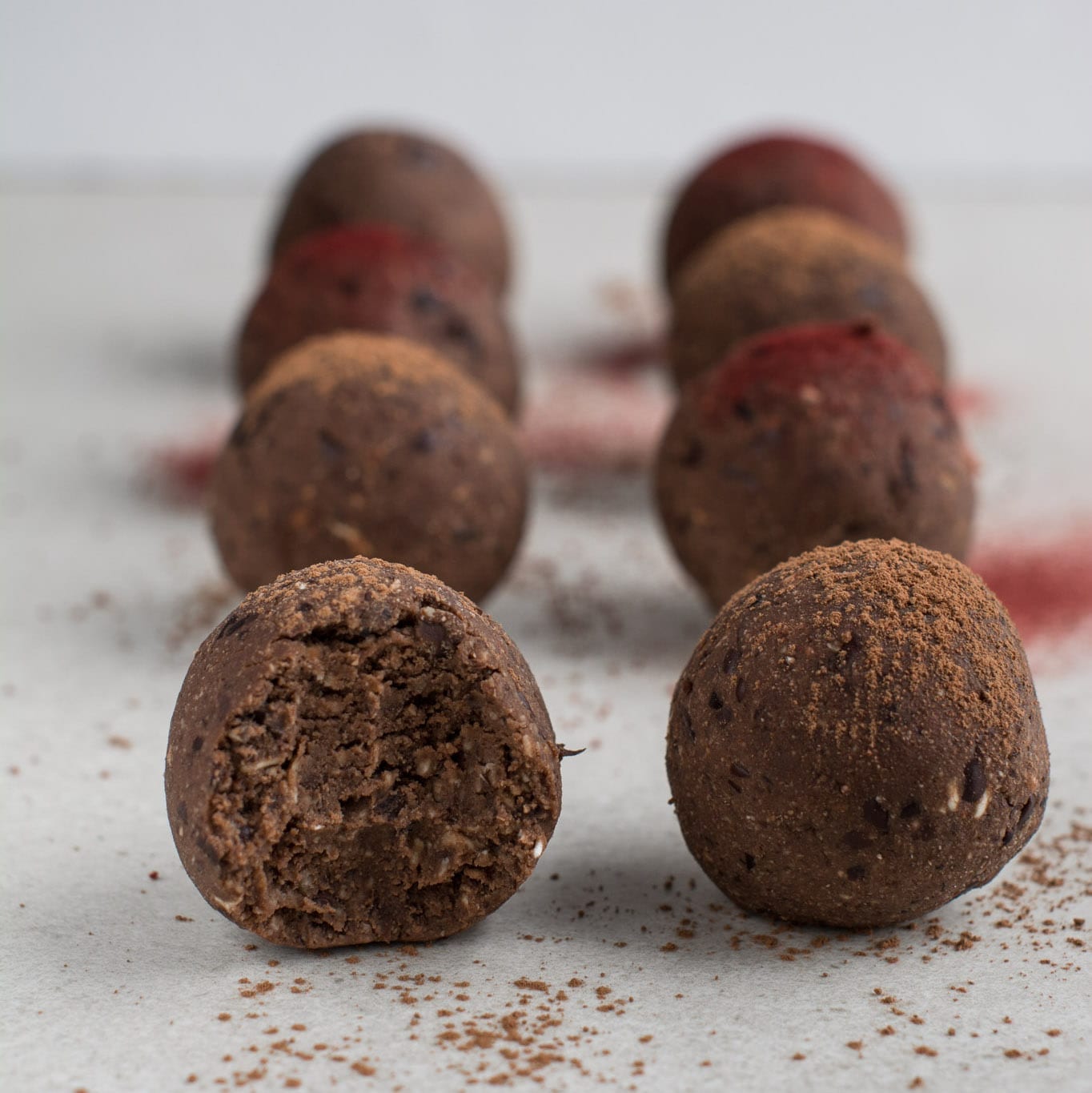 Healthy low-fat no dates chocolate bliss balls that make a great plant-based energy boosting sweet treat. Those energy balls are refined sugar free, oil-free and gluten-free.