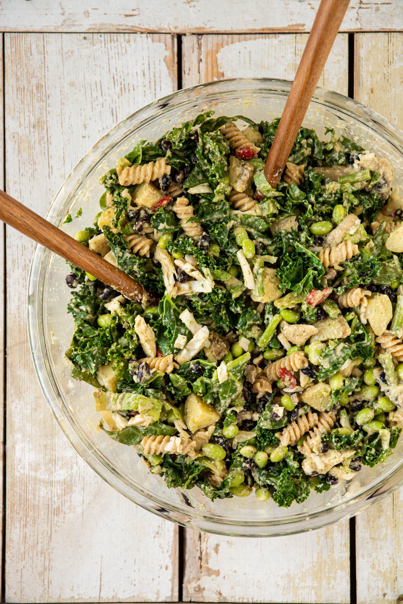 Learn how to make a quick and easy, balanced, delicious, and nutritious kale salad for the whole family.