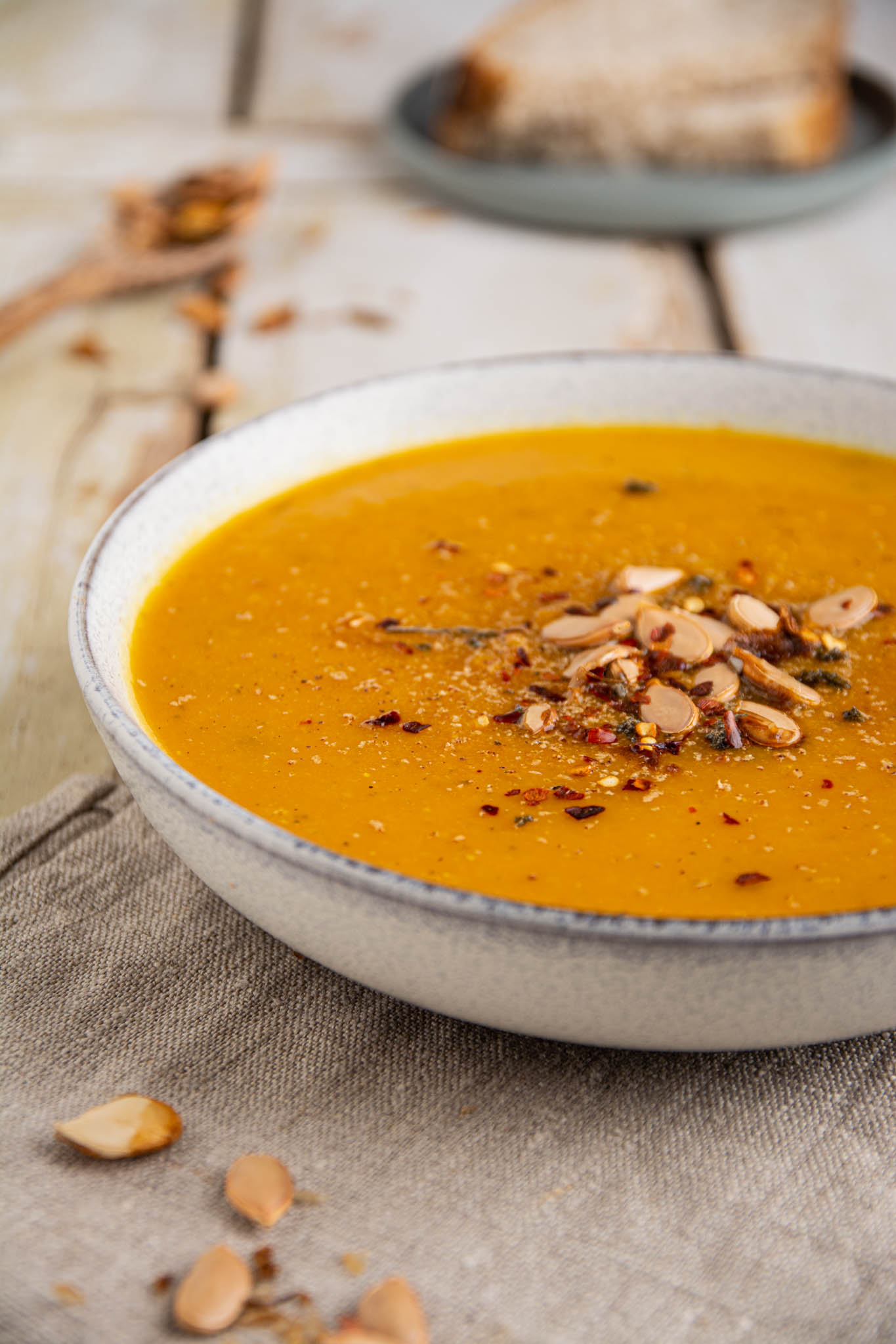 Learn how to make a hearty and healthy pumpkin soup recipe with lentils and sweet potato. This creamy and delicious soup is an excellent healthy and comforting autumnal meal.