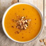 Learn how to make a hearty and healthy pumpkin soup recipe with lentils and sweet potato. This creamy and delicious soup is an excellent healthy and comforting autumnal meal.