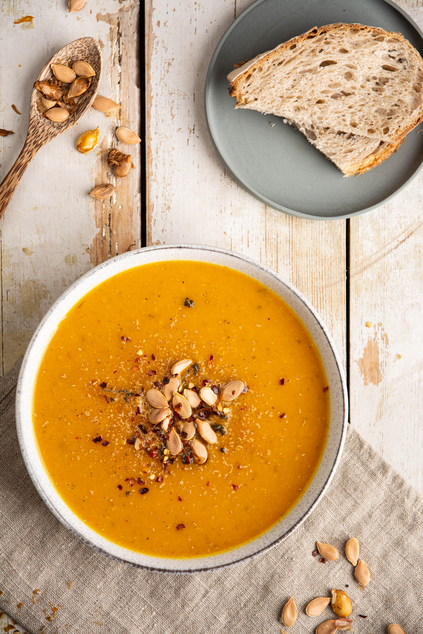 Learn how to make a hearty and healthy pumpkin soup recipe with lentils and sweet potato. This creamy and delicious soup is an excellent healthy and comforting autumnal meal.