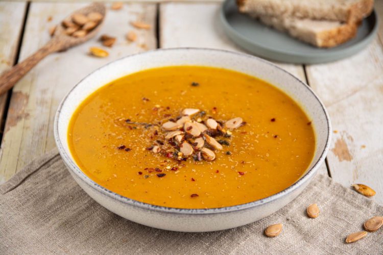 Learn how to make a hearty and healthy pumpkin soup recipe with lentils and sweet potato. This creamy and delicious soup is an excellent healthy and comforting autumnal meal.