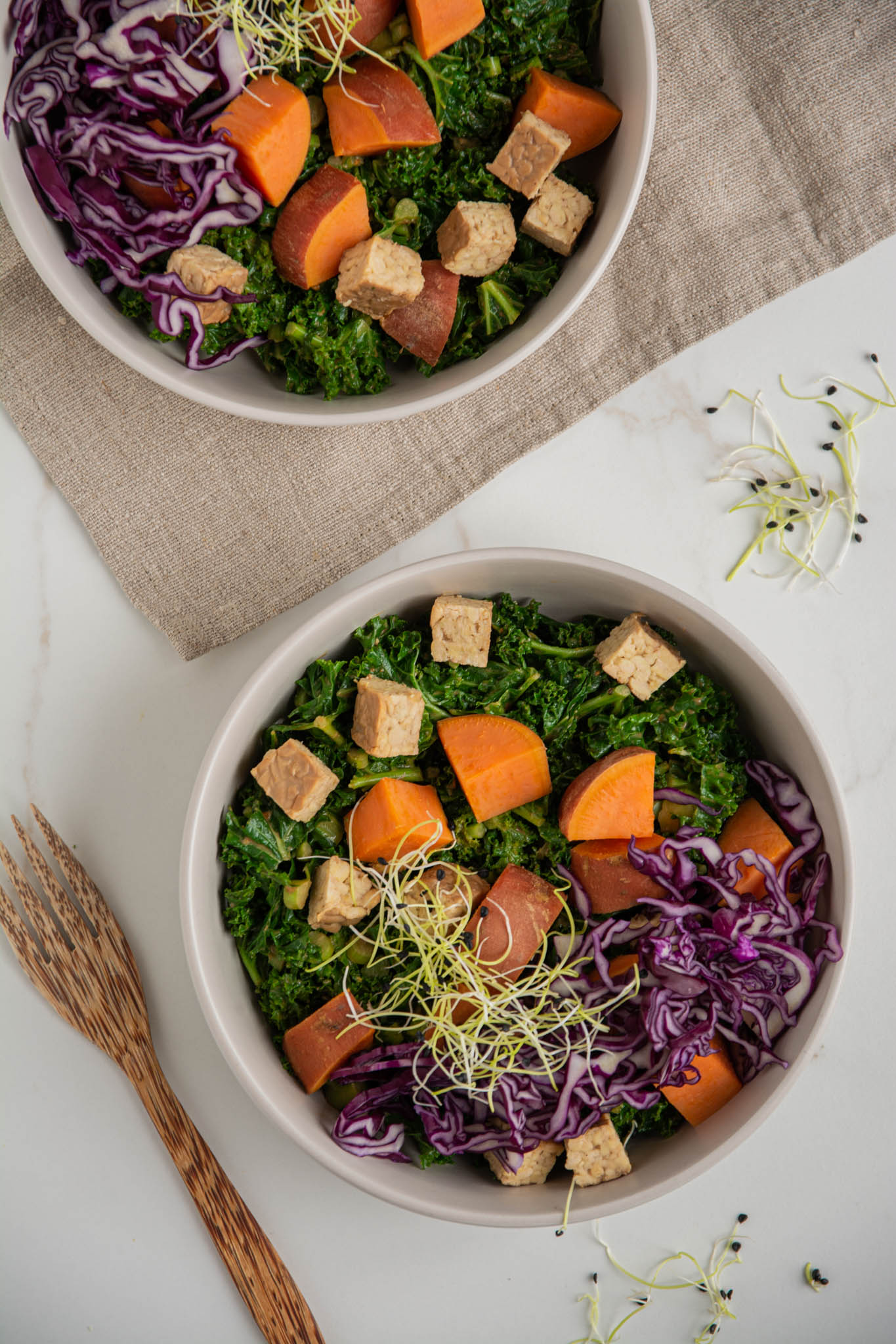 Any fan of kale will enjoy this healthy and delicious massaged kale salad that is ready in under 30 minutes. Steamed and massaged kale paired with sweet potatoes and tempeh makes a filling and nourishing plant-based meal. Using steamed kale for greater antioxidant capacity. 