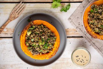 Learn how to make delicious and hearty festive vegan stuffed pumpkin with lentils, quinoa, and mushrooms. Moreover, my creamy and herby cashew-miso dressing will make this dish extra luscious.