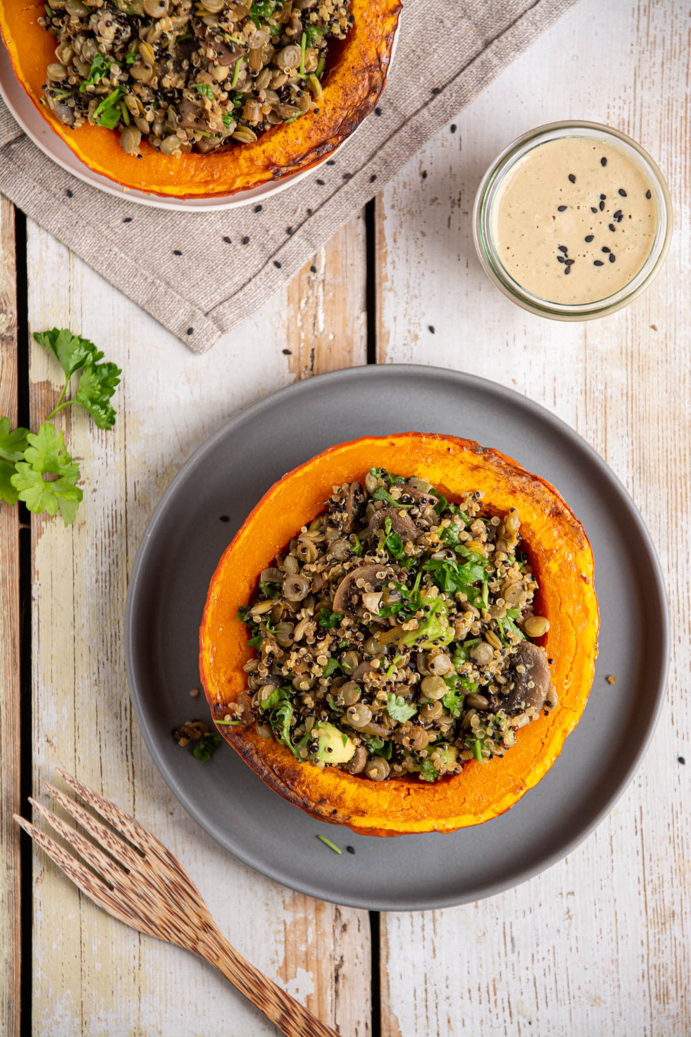 Learn how to make delicious and hearty festive vegan stuffed pumpkin with lentils, quinoa, and mushrooms. Moreover, my creamy and herby cashew-miso dressing will make this dish extra luscious.