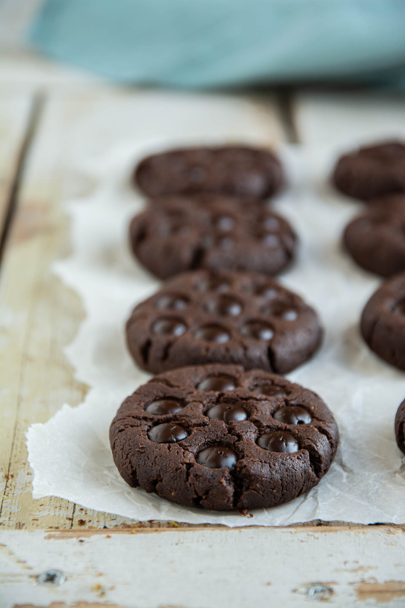 Learn how to make peanut butter chocolate chip cookies that are vegan, gluten-free, and oil-free. It’s a wholesome no butter recipe resulting in healthy soft and chewy plant-based cookies.