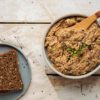 Delicious and easy low glycemic soybean and tofu hummus recipe with tahini. Enjoy the divine Mediterranean flavours of sun-dried tomatoes and dried basil.