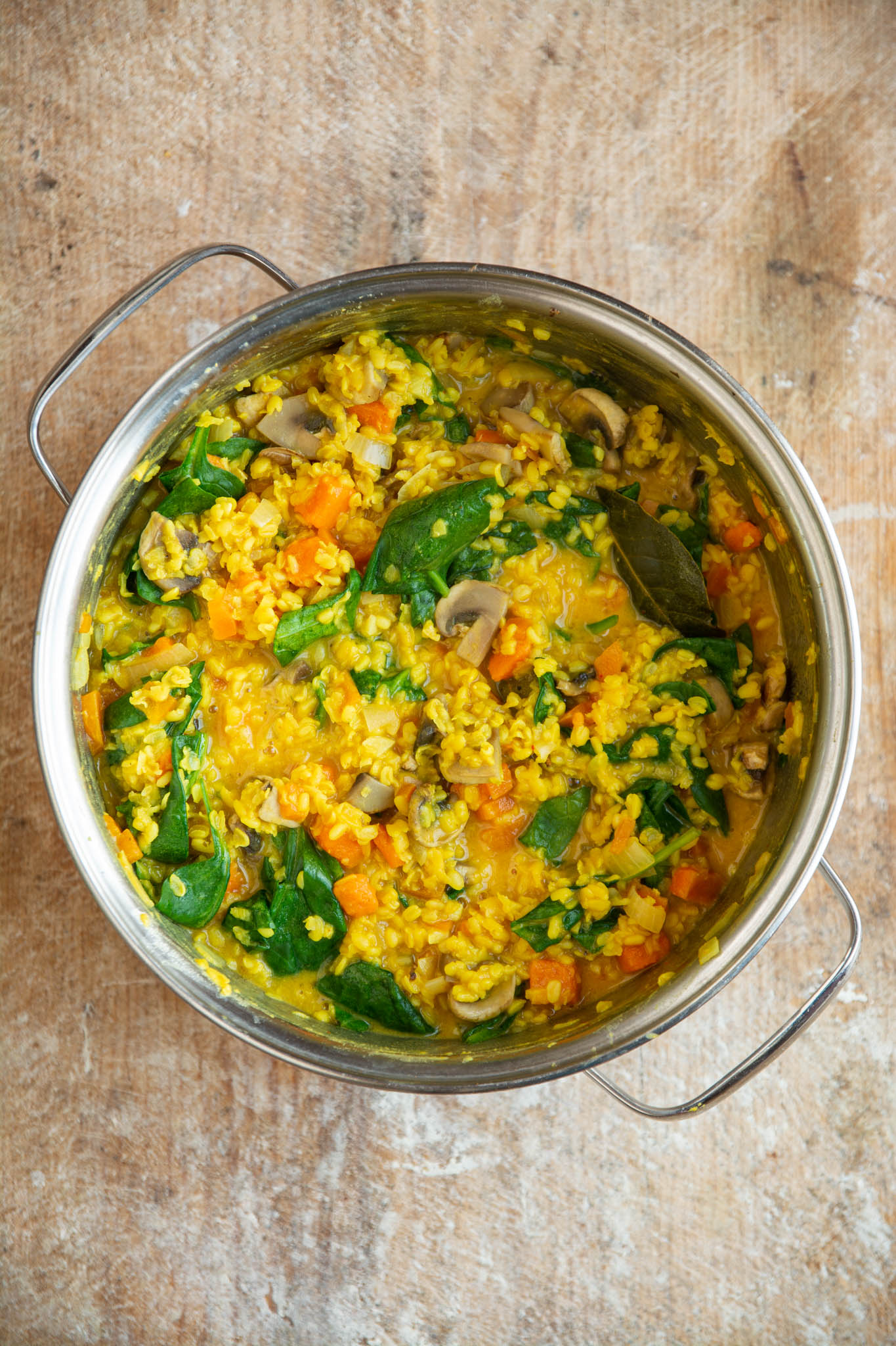 This creamy moong dal recipe with spinach and mushrooms is a great weekday meal accompanied by green salad and rice or pasta.